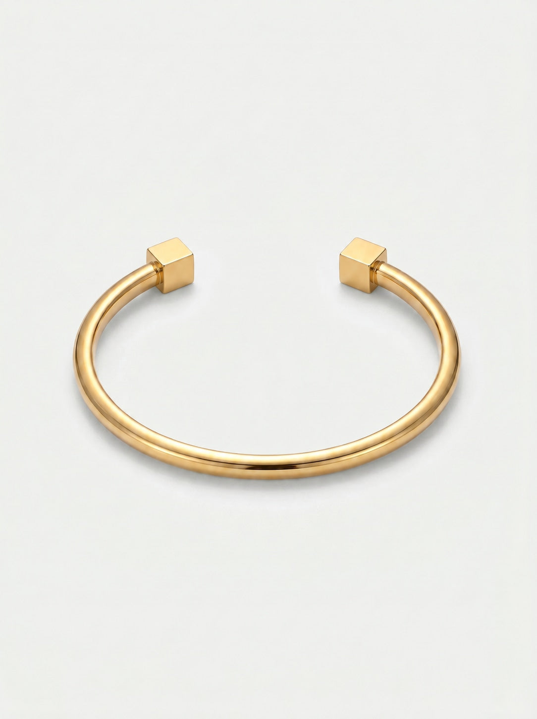 Pulseira Cuff Geométrica dourada — catálogo 2 com terminações cúbicas
