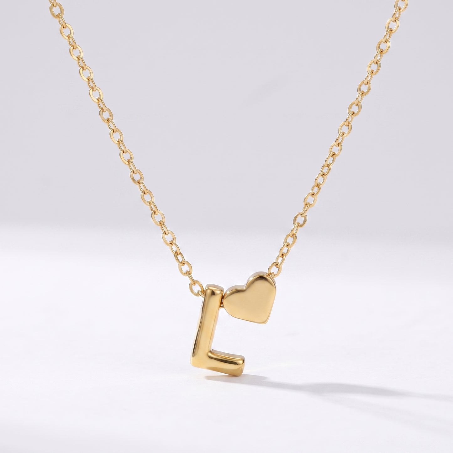 Colar letra L dourado com coração, colar personalizado feminino em aço inoxidável resistente à água.