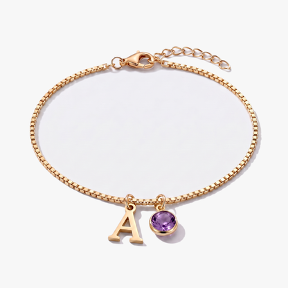 Pulseira letra A dourada com pedra de nascimento Fevereiro — Ametista
