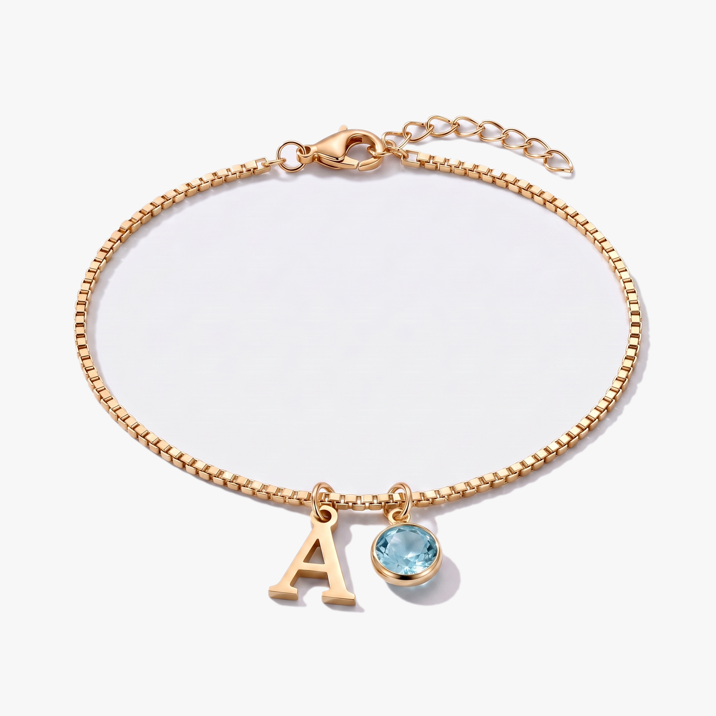 Pulseira letra A dourada com pedra de nascimento Março — Água-marinha