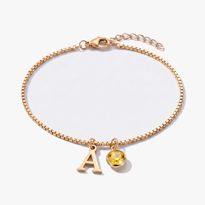 Pulseira letra A dourada com pedra de nascimento Novembro — Citrino