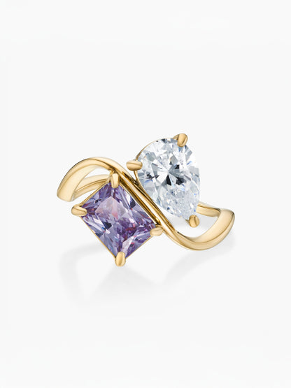 Anel duas pedras Abril-Diamante (pera) e Fevereiro-Ametista (retângulo) dourado
