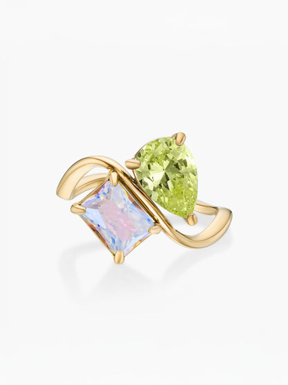 Anel duas pedras Agosto-Peridoto (pera) e Junho-Alexandrite (retângulo) dourado