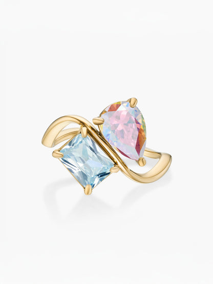 Anel duas pedras Junho-Alexandrite (pera) e Março-Água-marinha (retângulo) dourado