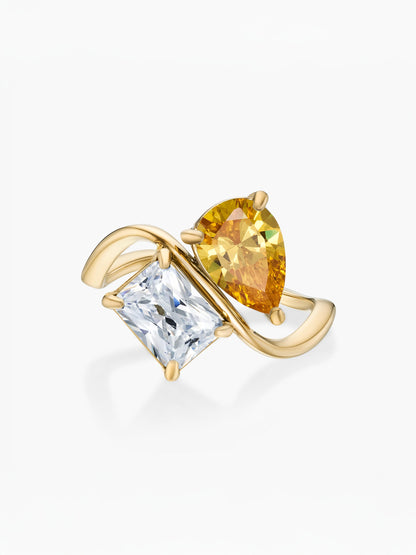 Anel duas pedras Novembro-Citrino (pera) e Abril-Diamante (retângulo) dourado