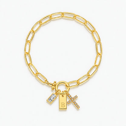 Pulseira dourada com inicial B e cruz
