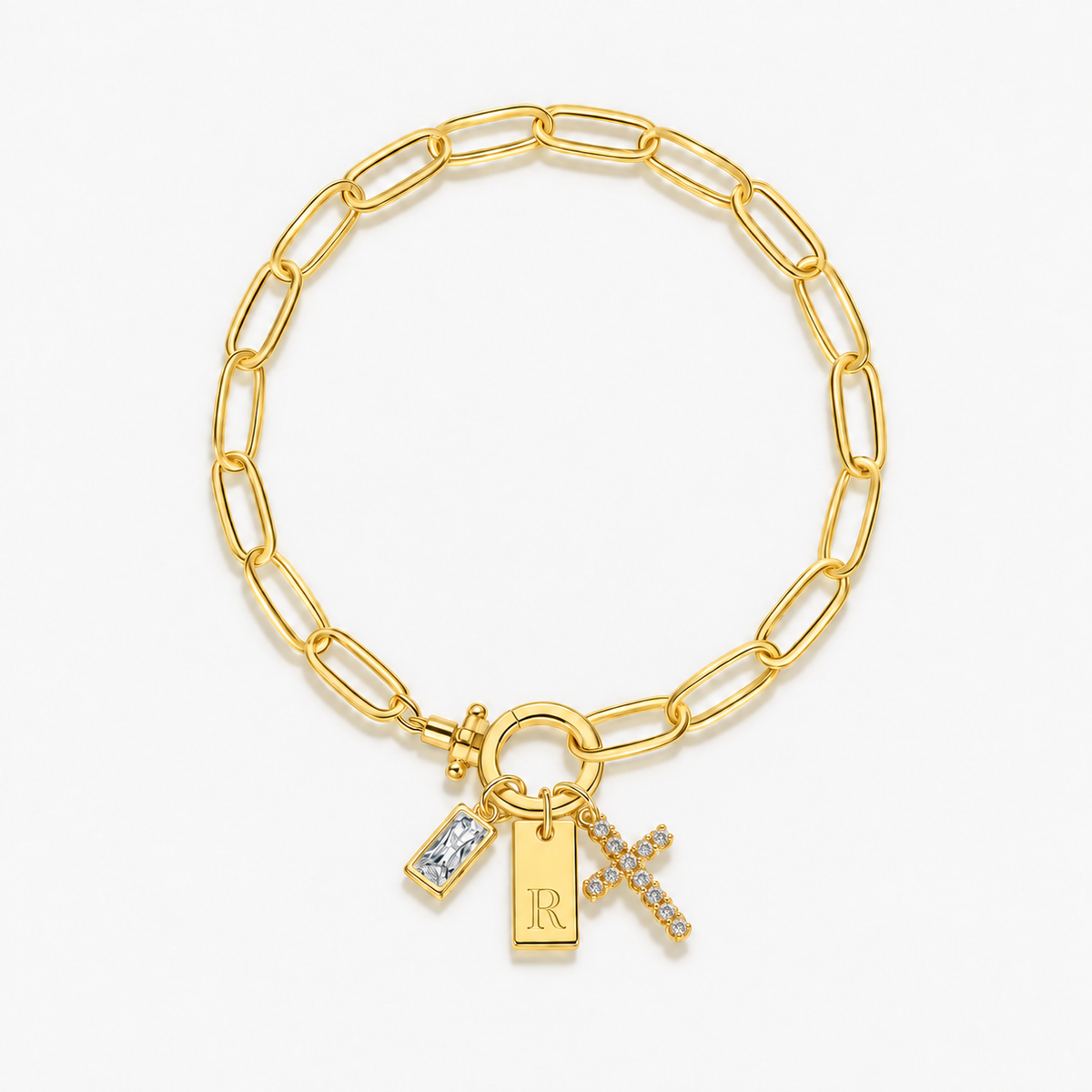 Pulseira dourada com inicial R e cruz