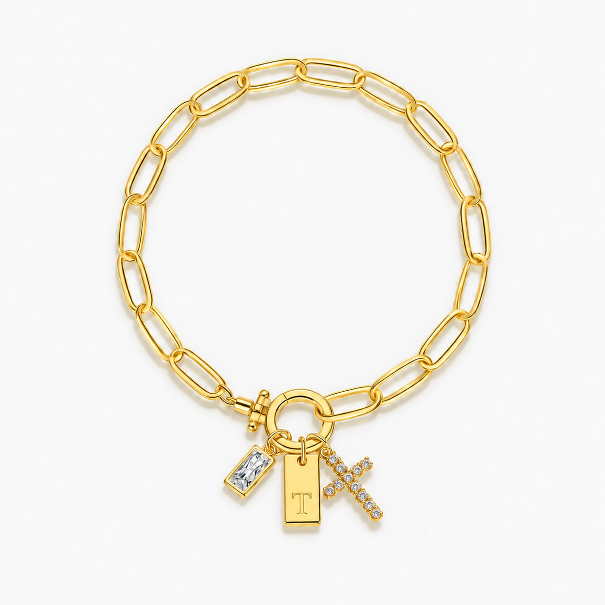Pulseira dourada com inicial T e cruz