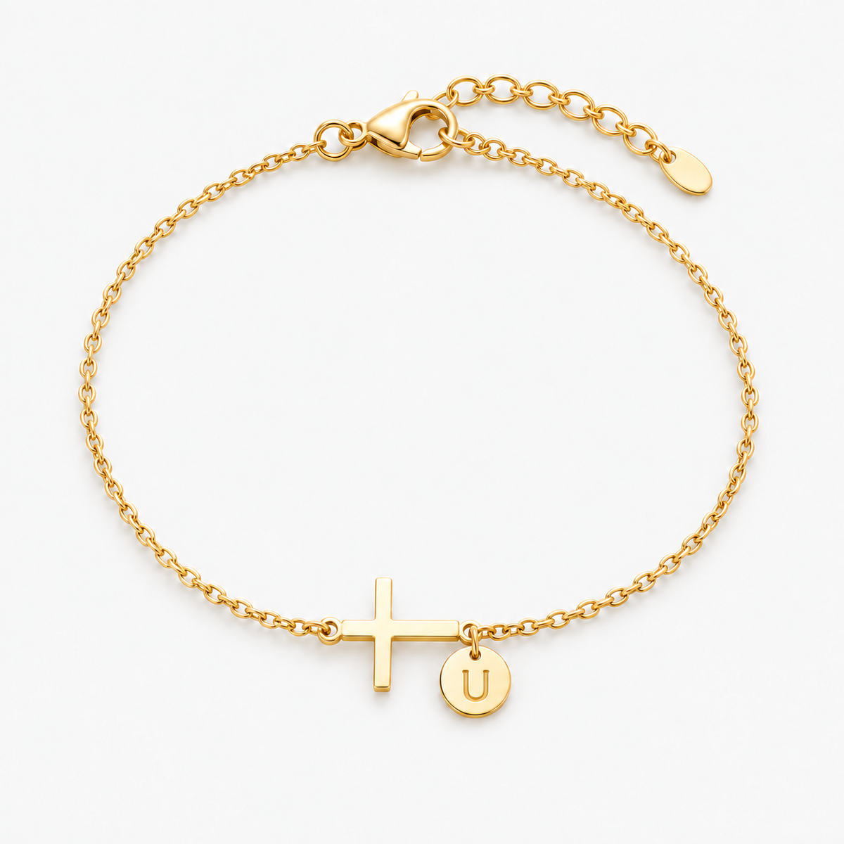 Pulseira personalizada com letra U e cruz — dourada