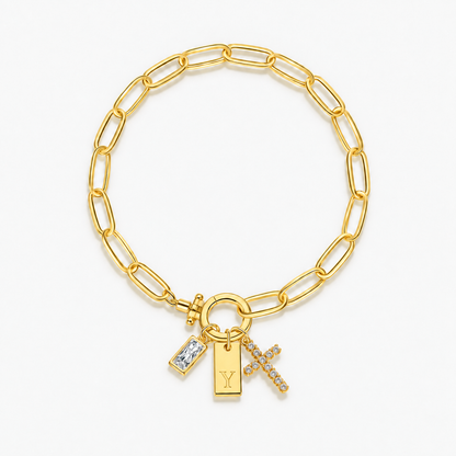 Pulseira dourada com inicial Y e cruz