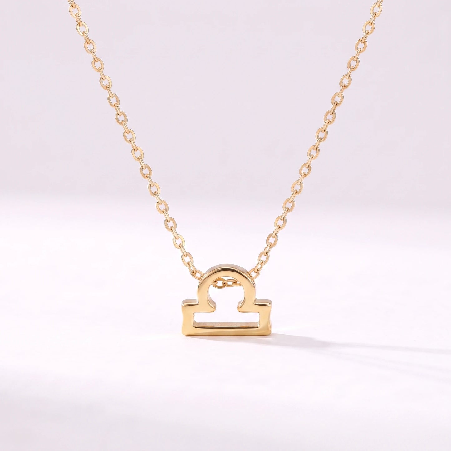 Colar símbolo do zodíaco Balança dourado