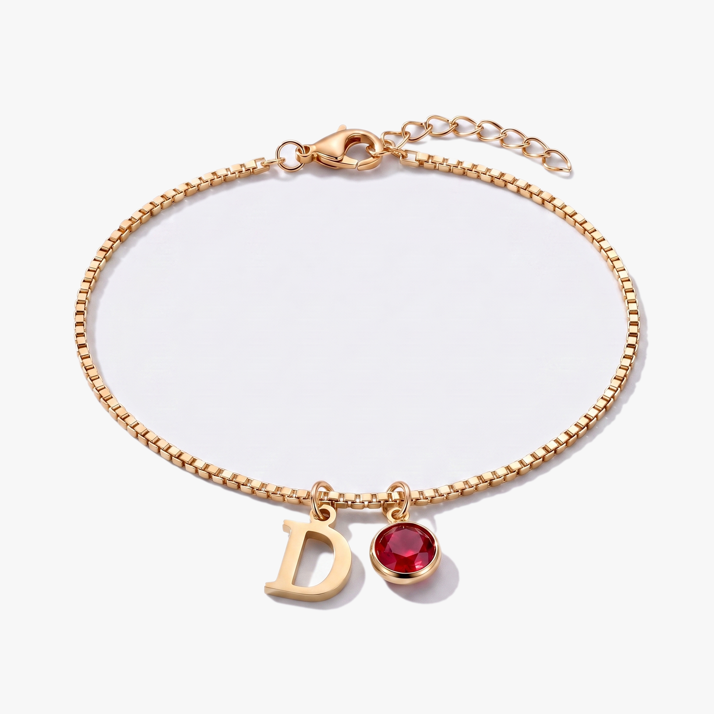 Pulseira letra D dourada com pedra de nascimento Janeiro — Granada