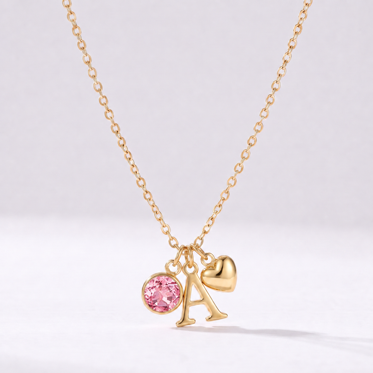 Colar letra A dourado com pedra de nascimento Outubro — Turmalina Rosa e coração