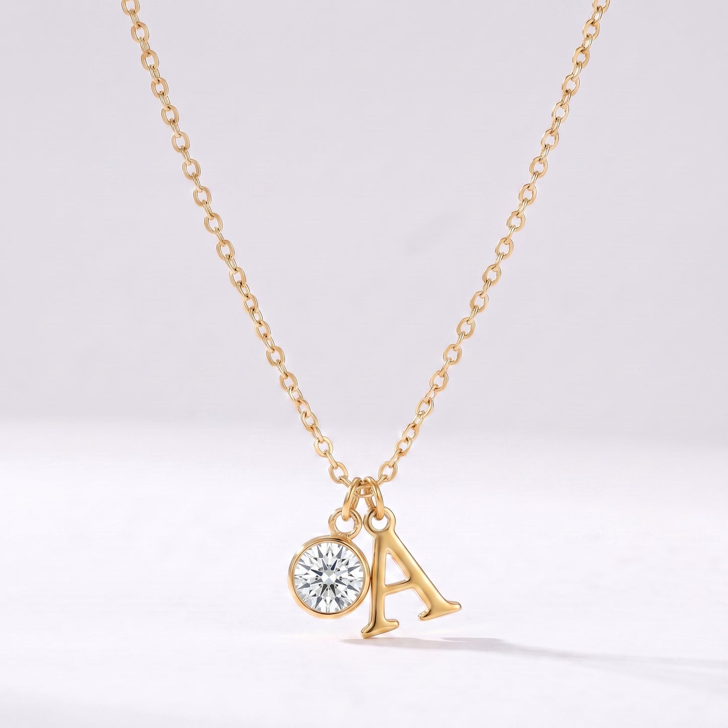 Colar letra A dourado com pedra de nascimento Abril — Diamante