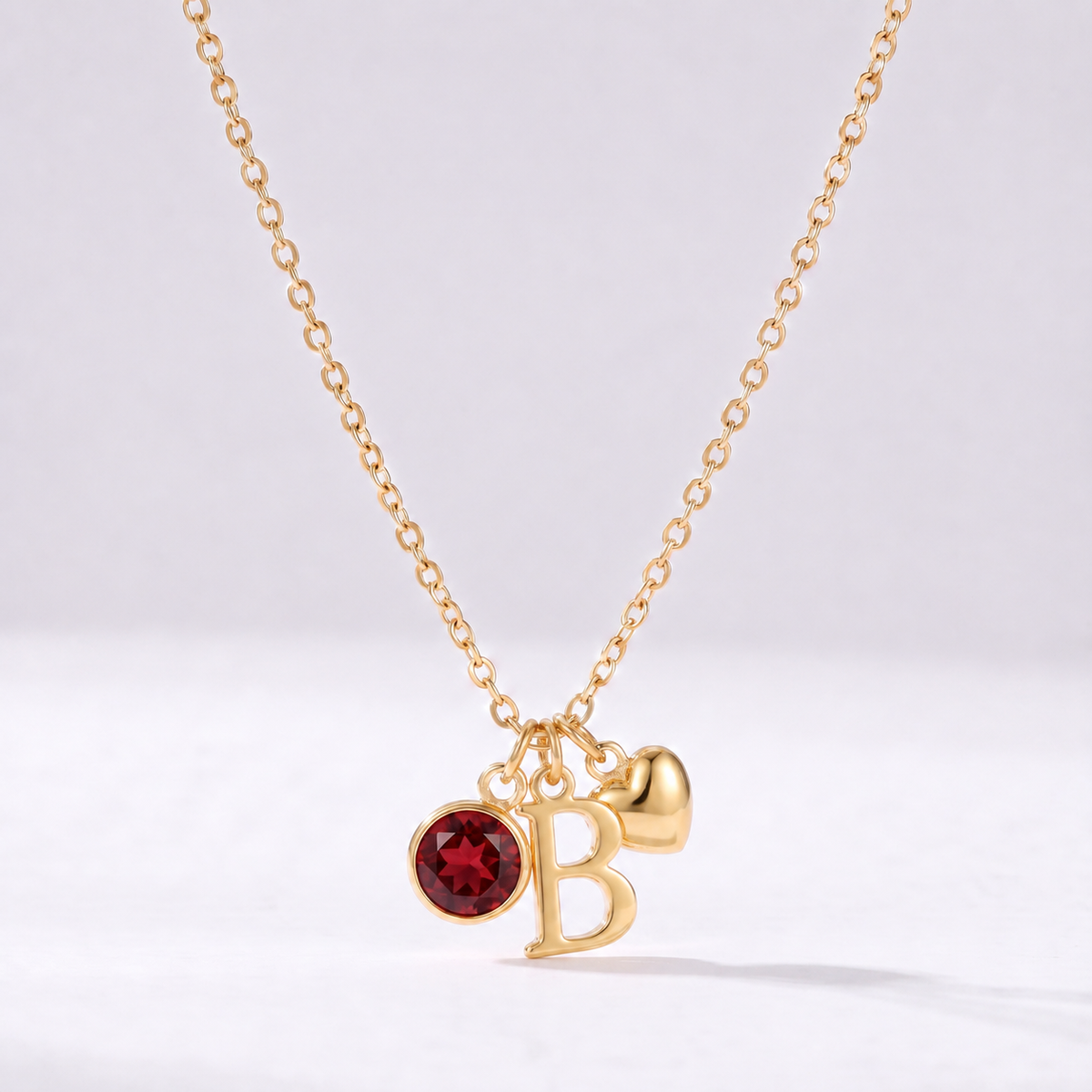 Colar letra B dourado com pedra de nascimento e coração