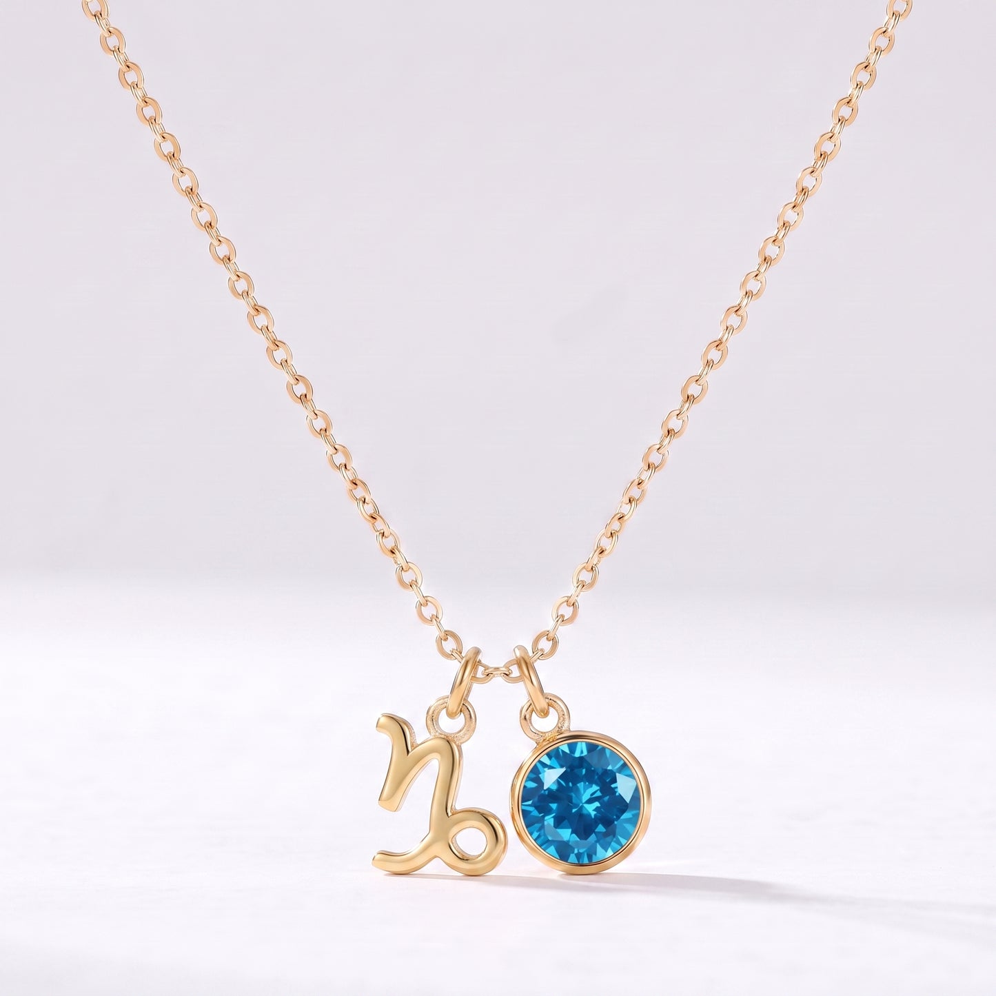 Colar signo do zodíaco Capricórnio dourado com pedra de nascimento Azul Fornecedor