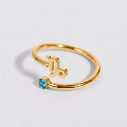 Anel signo do zodíaco Capricórnio dourado com pedra Topázio Azul