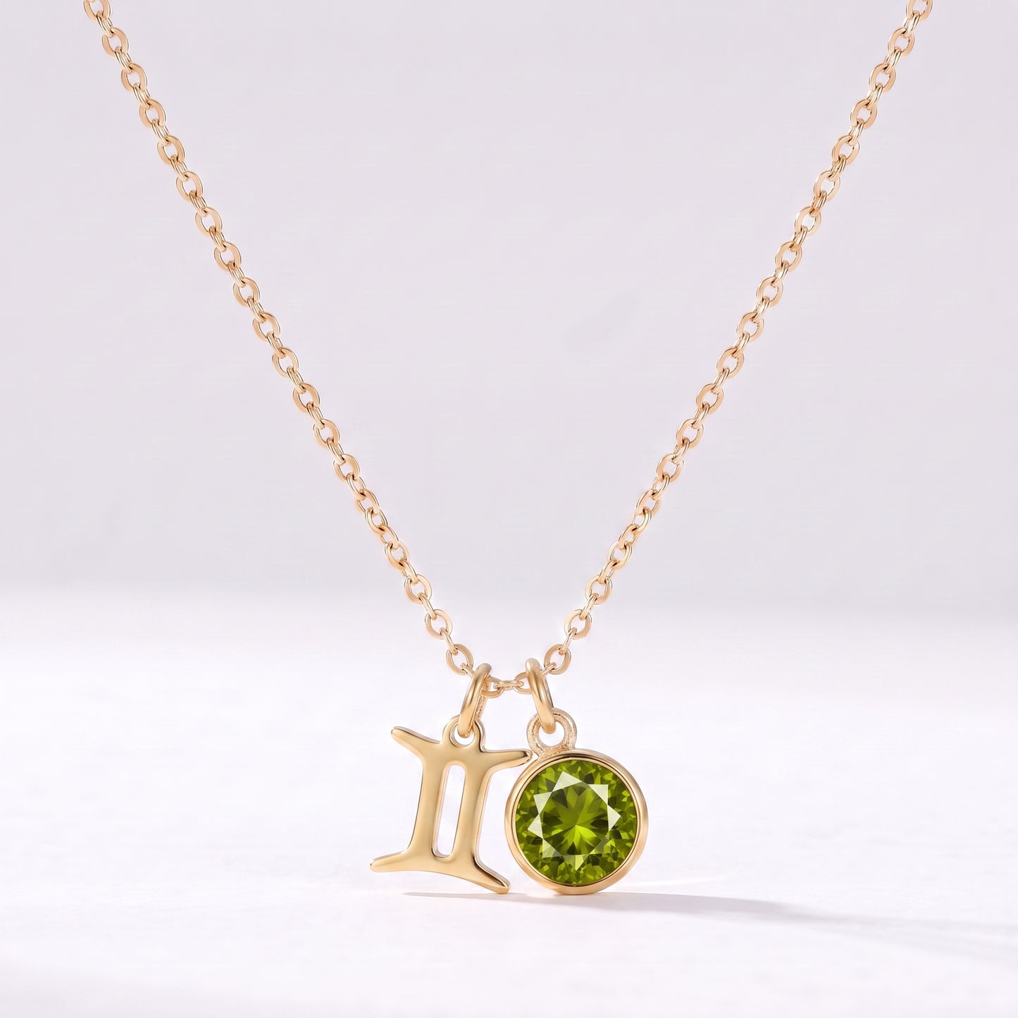 Colar signo do zodíaco Gémeos dourado com pedra de nascimento Peridoto