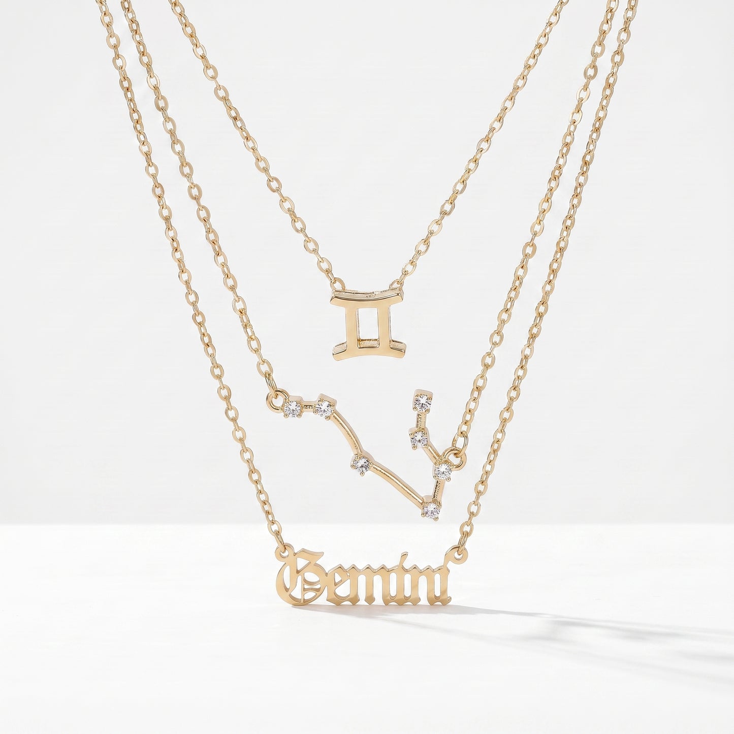 Conjunto 3 colares signo Gémeos dourado
