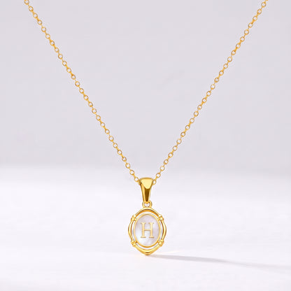 Colar oval com letra personalizada H dourado