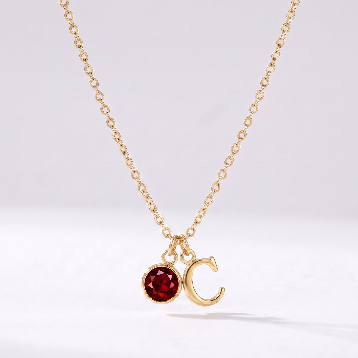 Colar letra C dourado com pedra de nascimento