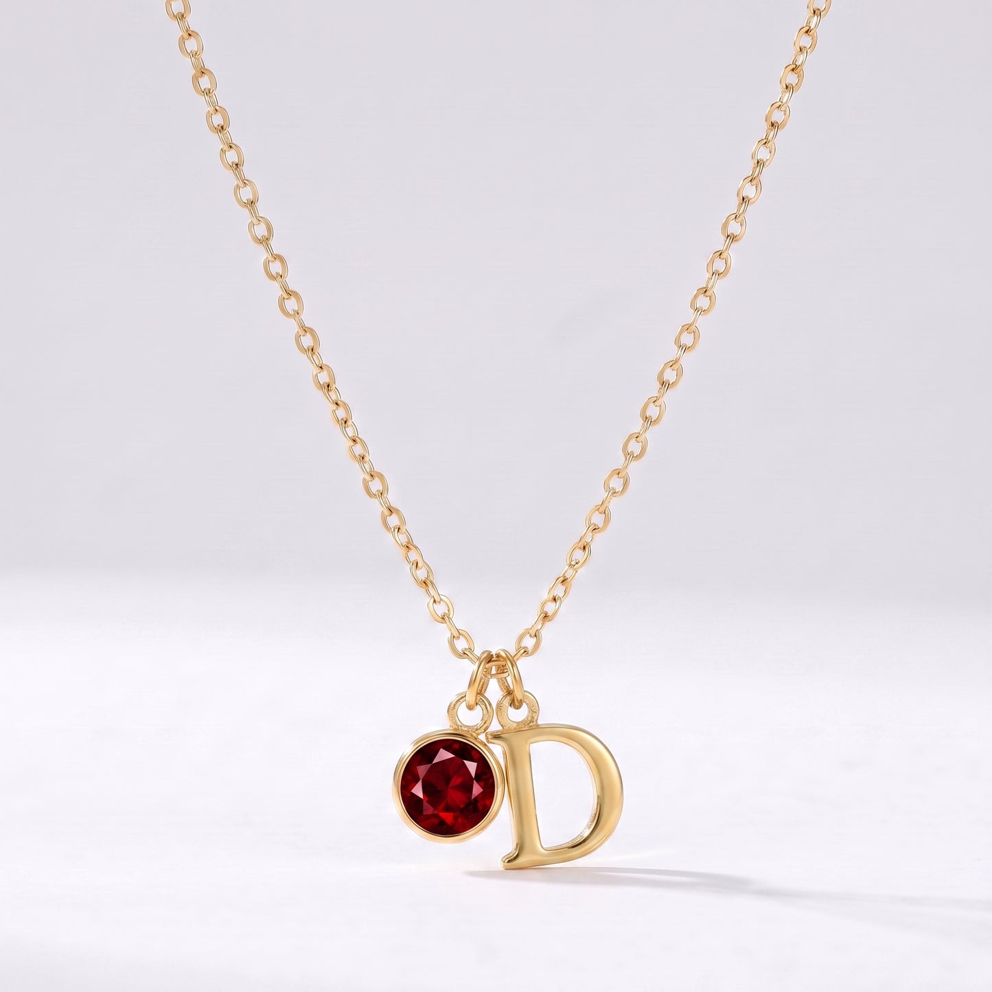Colar letra D dourado com pedra de nascimento