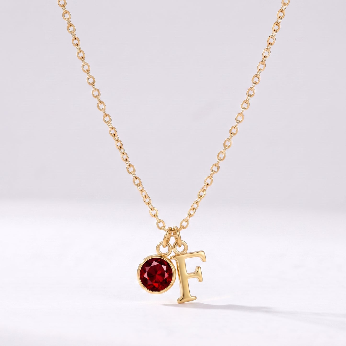 Colar letra F dourado com pedra de nascimento
