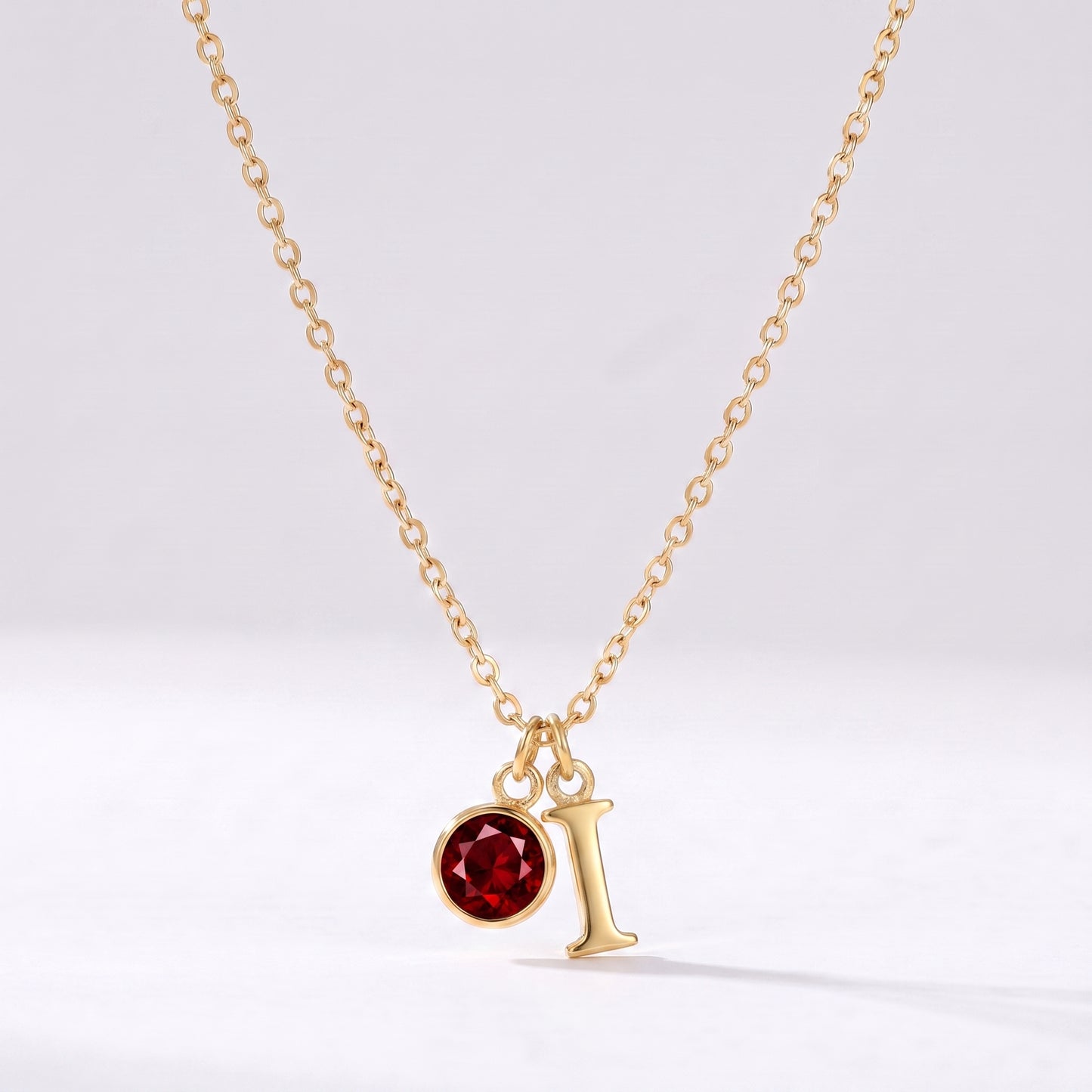 Colar letra I dourado com pedra de nascimento