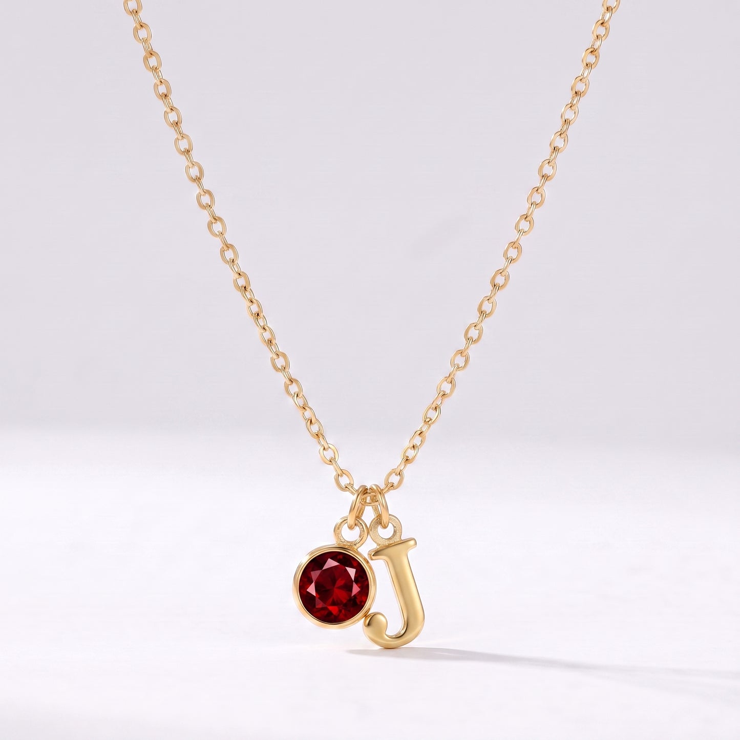 Colar letra J dourado com pedra de nascimento