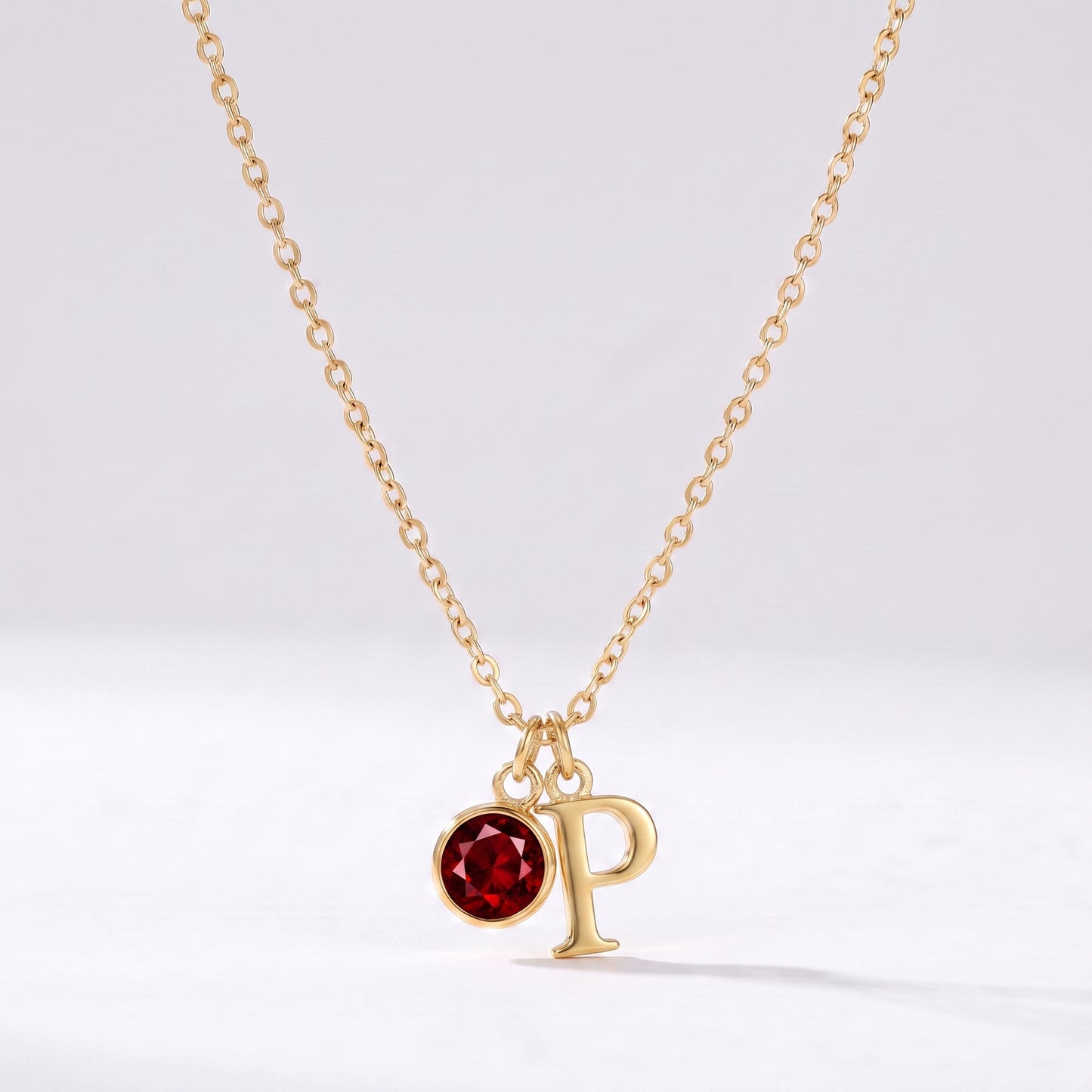 Colar letra P dourado com pedra de nascimento