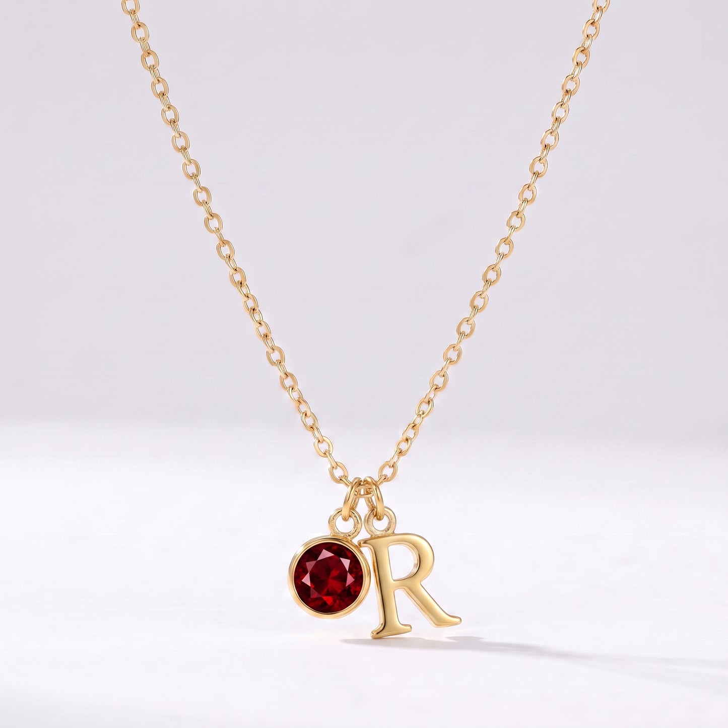 Colar letra R dourado com pedra de nascimento