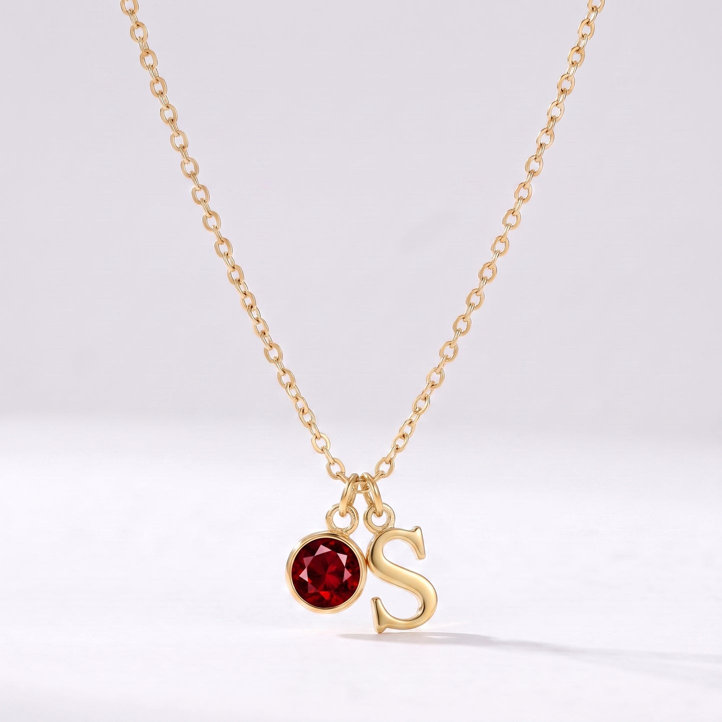 Colar letra S dourado com pedra de nascimento