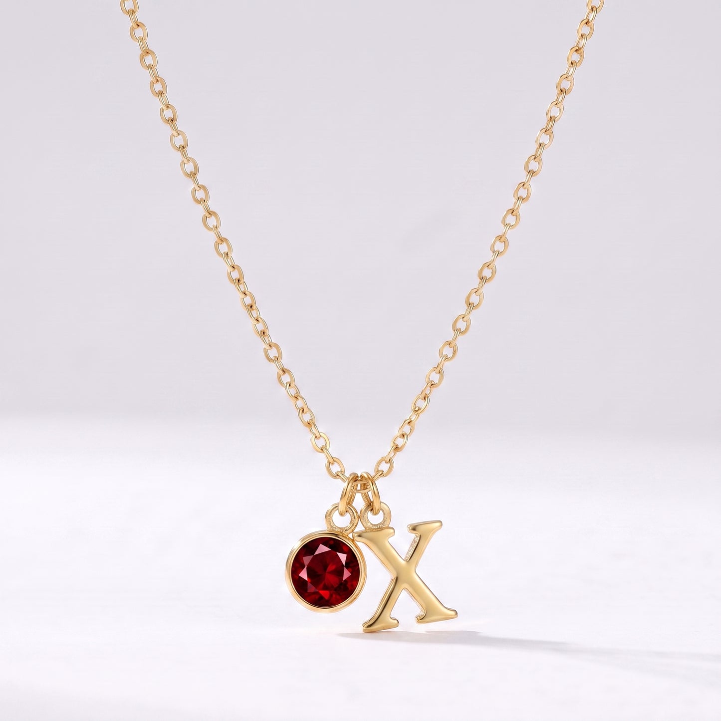 Colar letra X dourado com pedra de nascimento