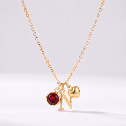 Colar letra N dourado com pedra de nascimento e coração