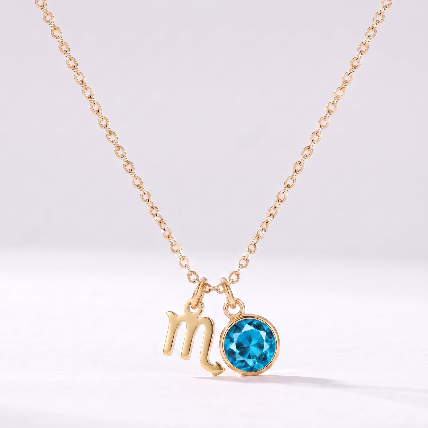 Colar signo do zodíaco Escorpião dourado com pedra de nascimento Topázio Azul