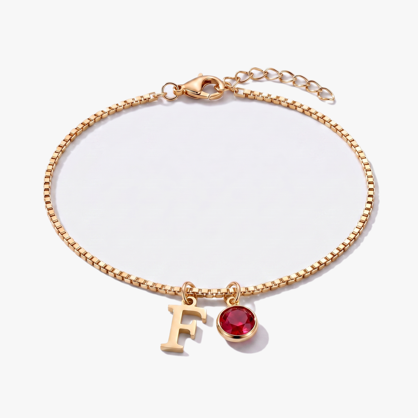 Pulseira letra F dourada com pedra de nascimento Janeiro — Granada