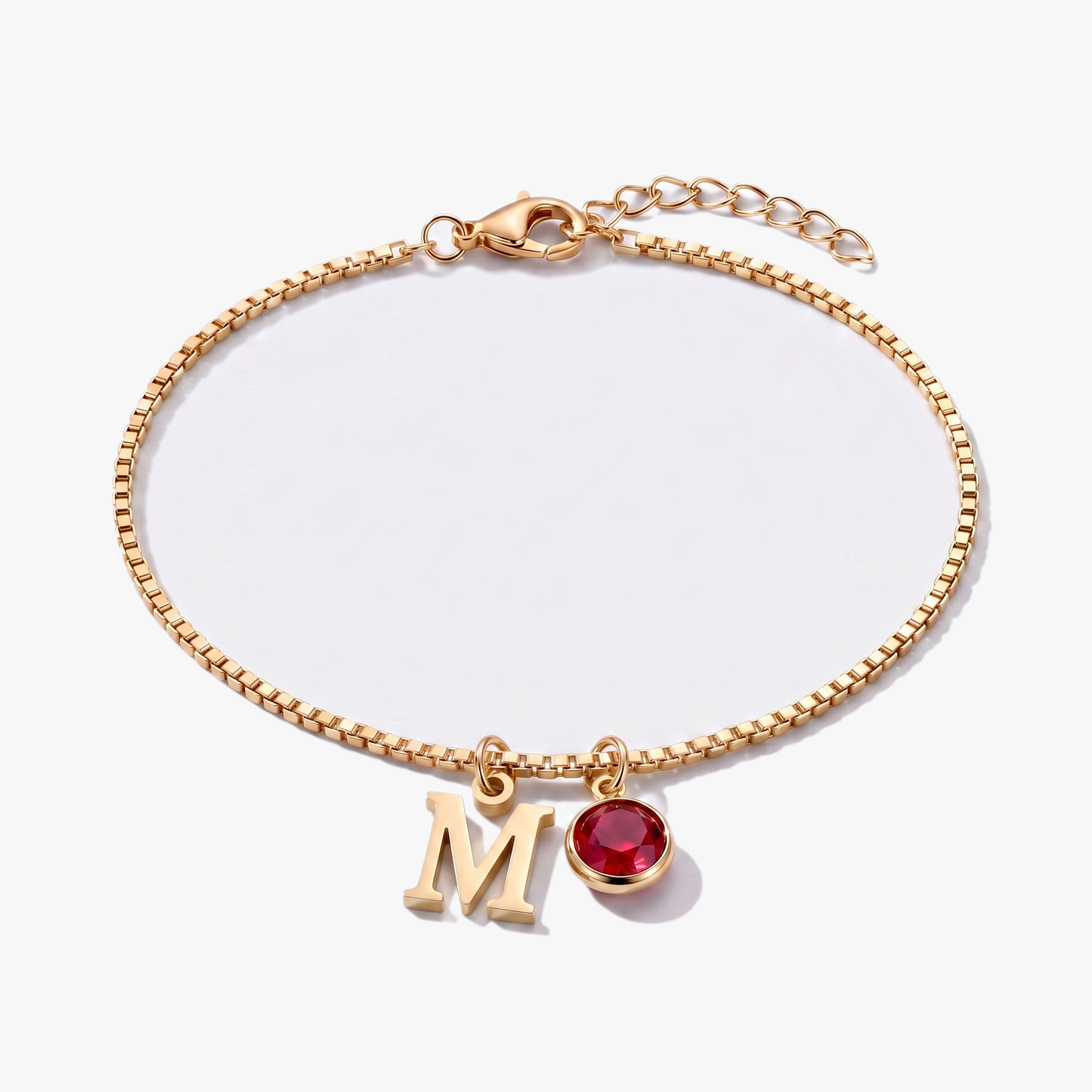 Pulseira letra M dourada com pedra de nascimento Janeiro — Granada
