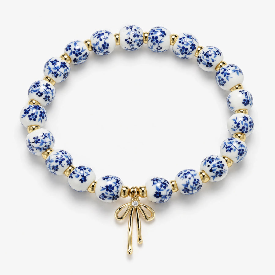 Pulseira Laço Azulejo em cerâmica azul e branca com detalhes dourados