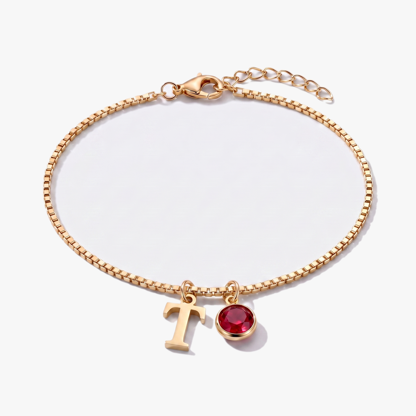 Pulseira letra T dourada com pedra de nascimento Janeiro — Granada