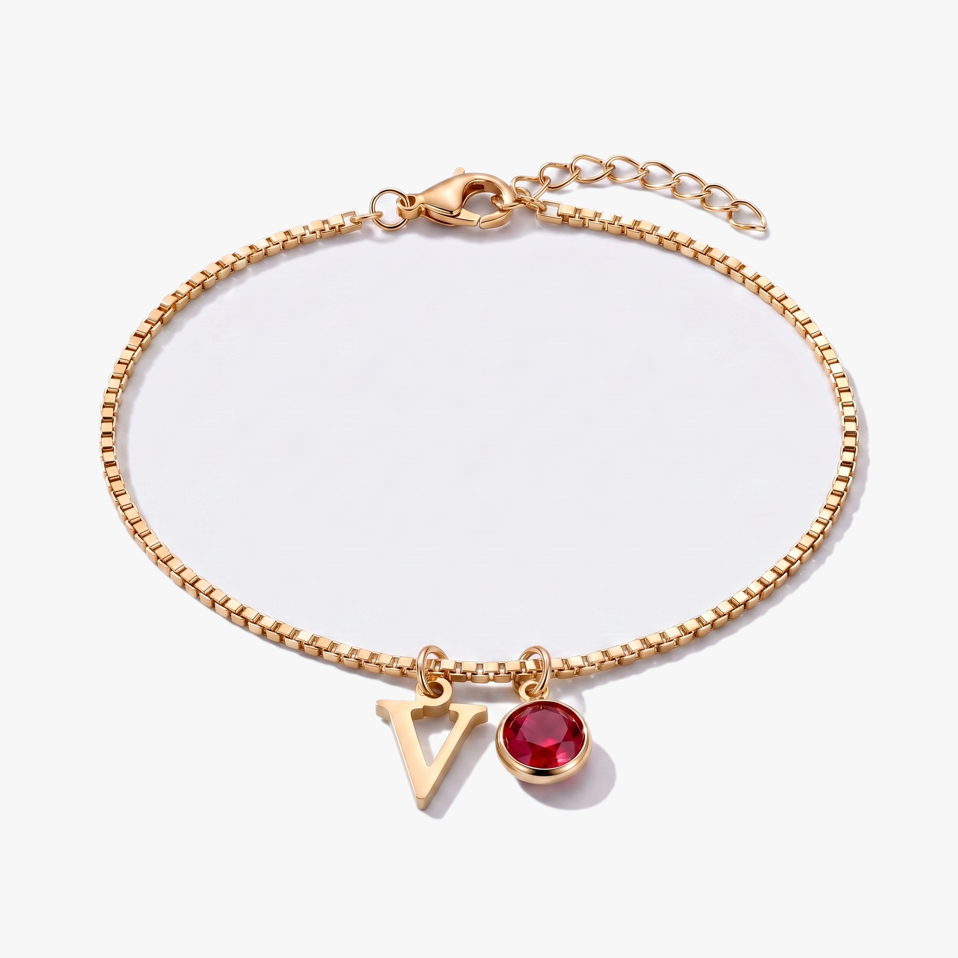 Pulseira letra V dourada com pedra de nascimento Janeiro — Granada