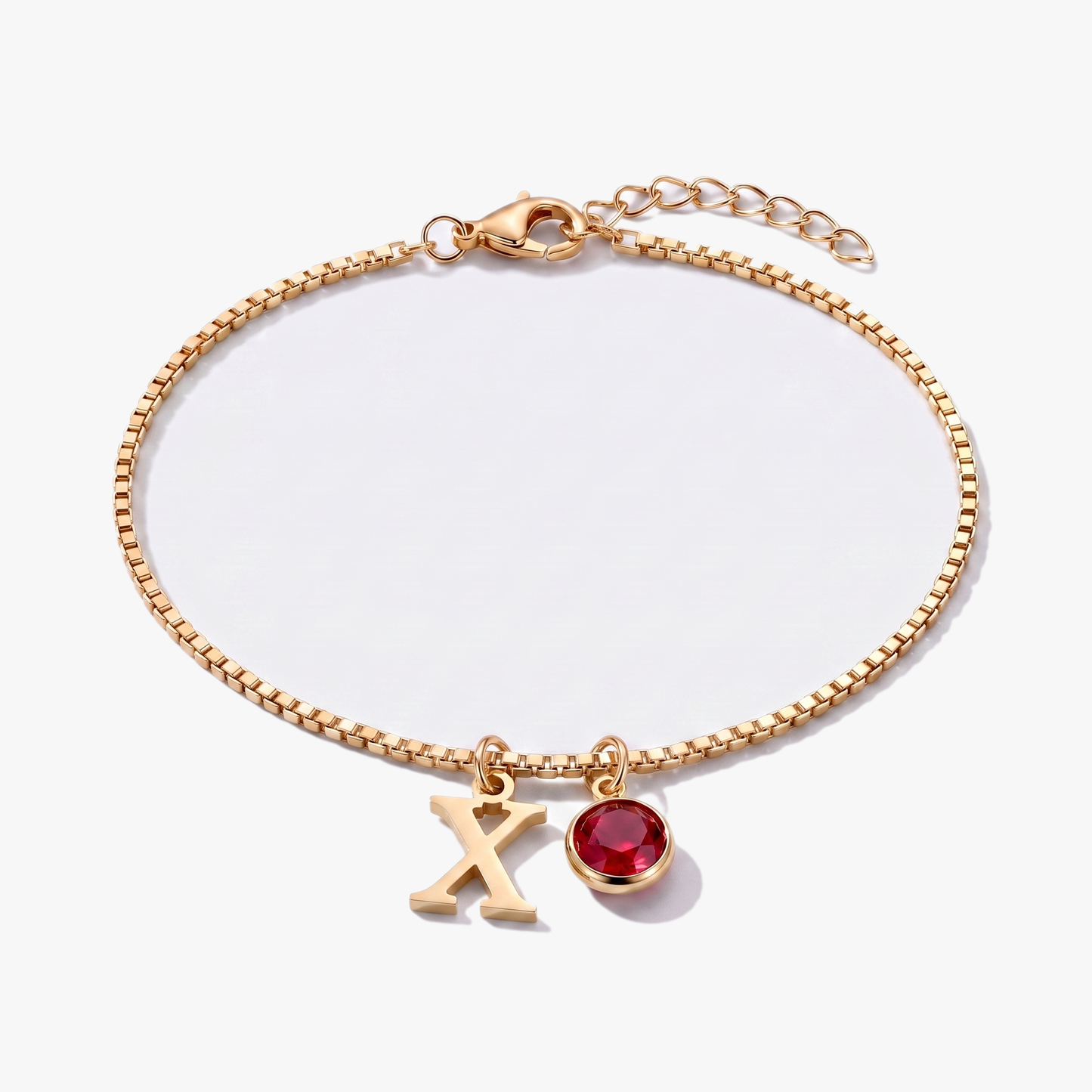 Pulseira letra X dourada com pedra de nascimento Janeiro — Granada