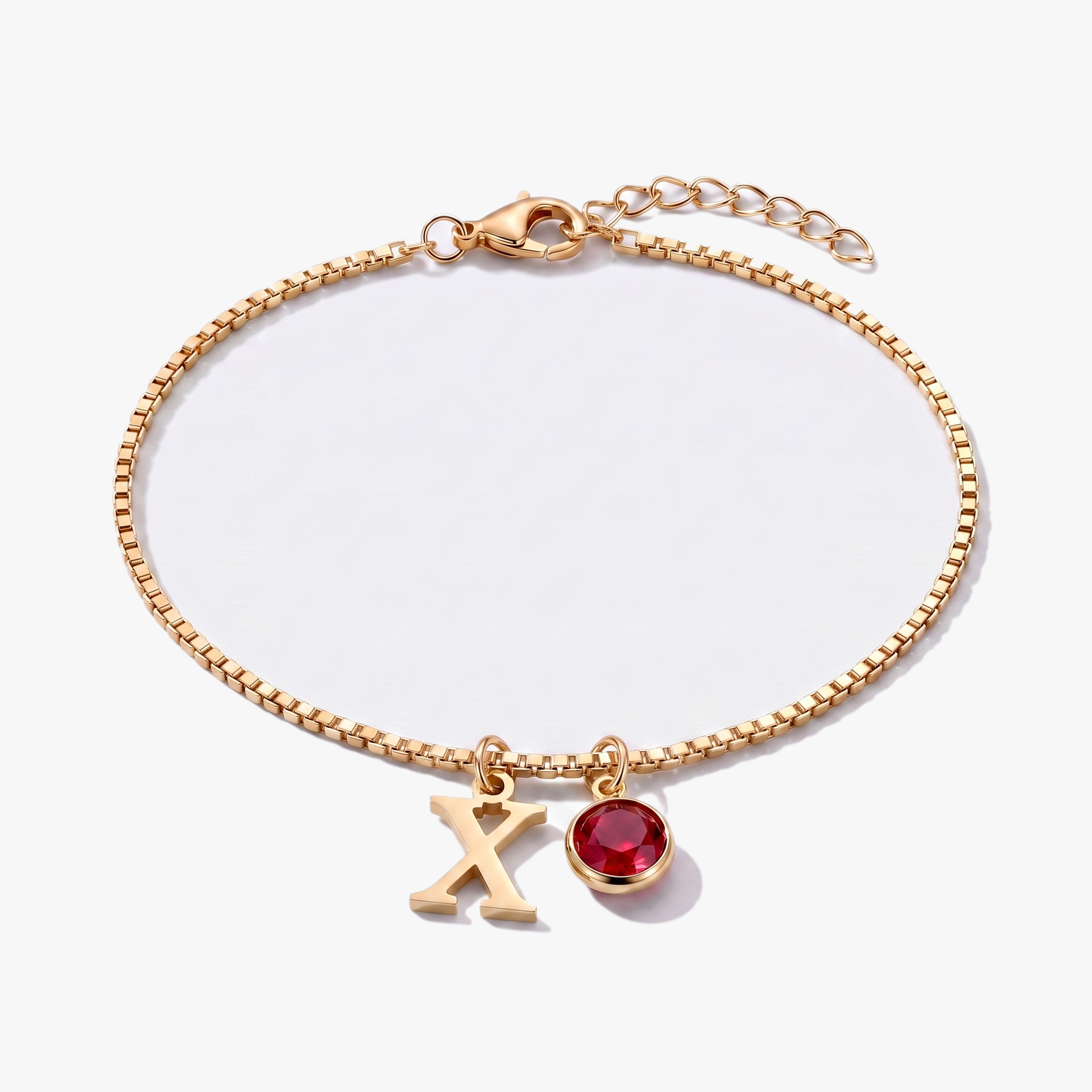 Pulseira letra X dourada com pedra de nascimento Janeiro — Granada